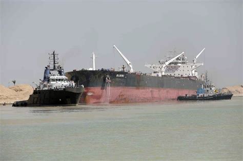 Two tankers collided in Egypt’s Suez Canal, briefly disrupting traffic in the vital waterway